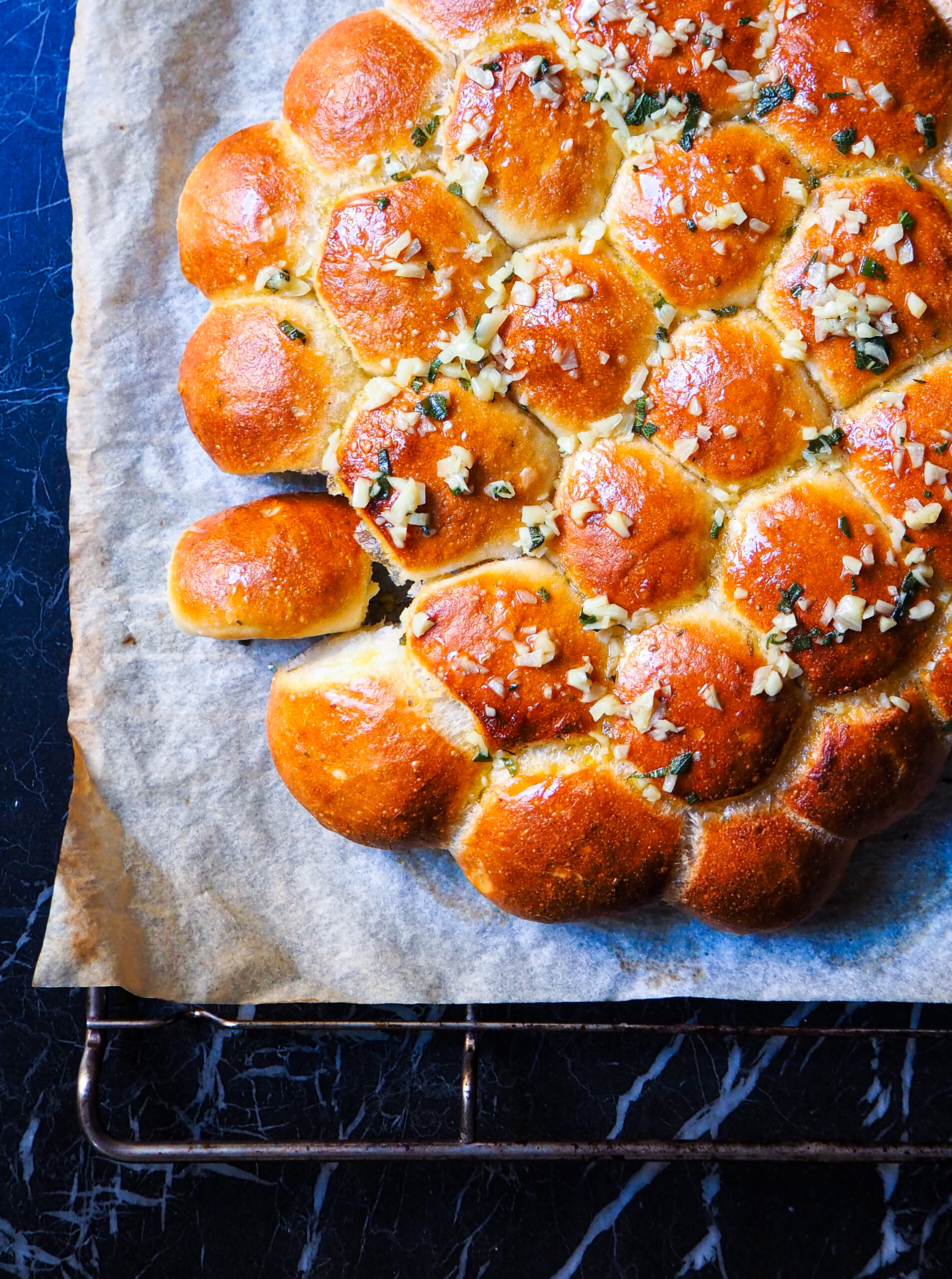 a close up of the vegan garlic tear and share bread