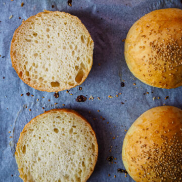 top view of brioche buns on a baking tray
