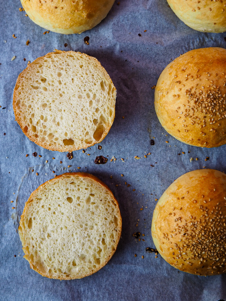 top view of brioche buns on a baking tray 